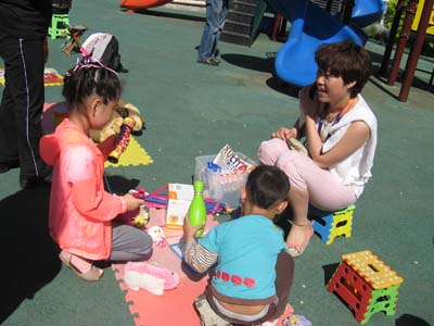 The Carebaby Wangjing Kindergarten held a charity bazaar in Beijing on May 10, 2013, to raise funds for the Water Cellar for Mothers Project. [mothercellar.cn]